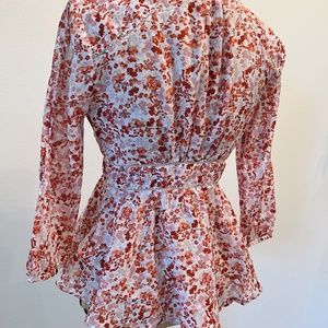 Anthropologie Flower Shirt. Never been worn. Peplum Style